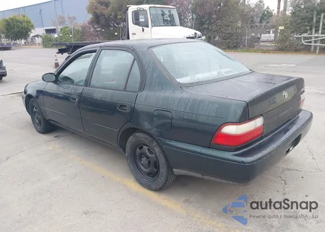 1997 Toyota Corolla Std z USA, uszkodzony, nr VIN 1NXBA02E1VZ619295